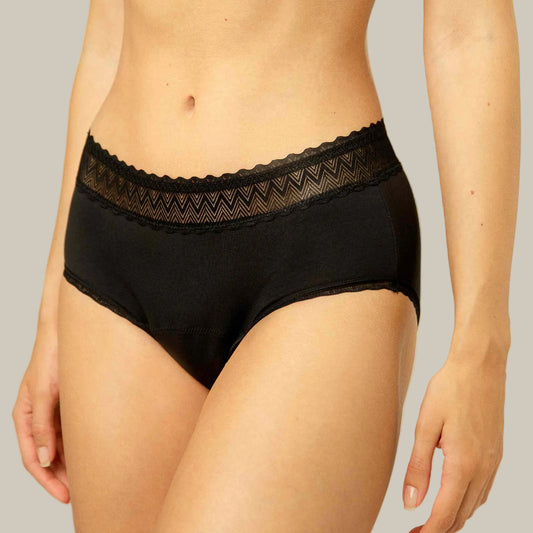 a front view of a woman wearing black TENCEL™ Leakproof Lace Hipster