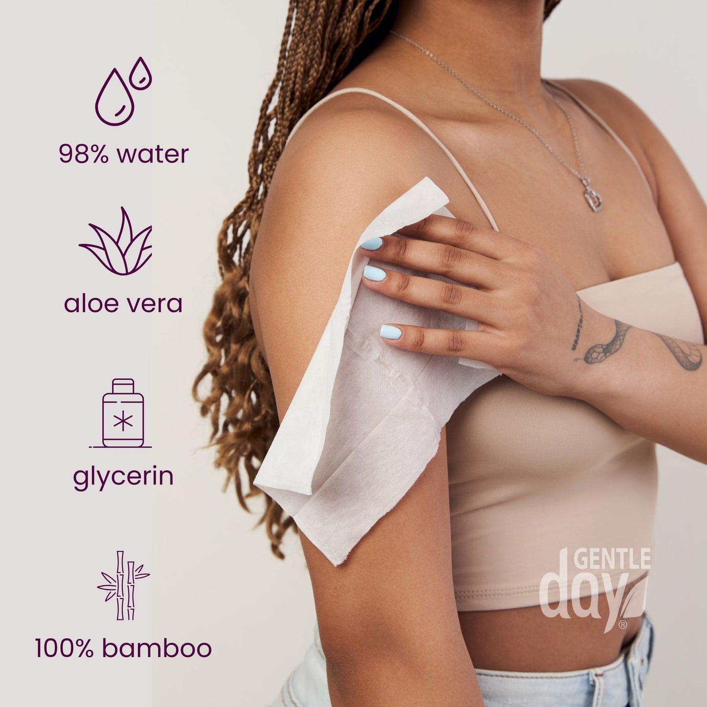 Woman wiping her skin with Gentle Day bamboo unscented wet wipes