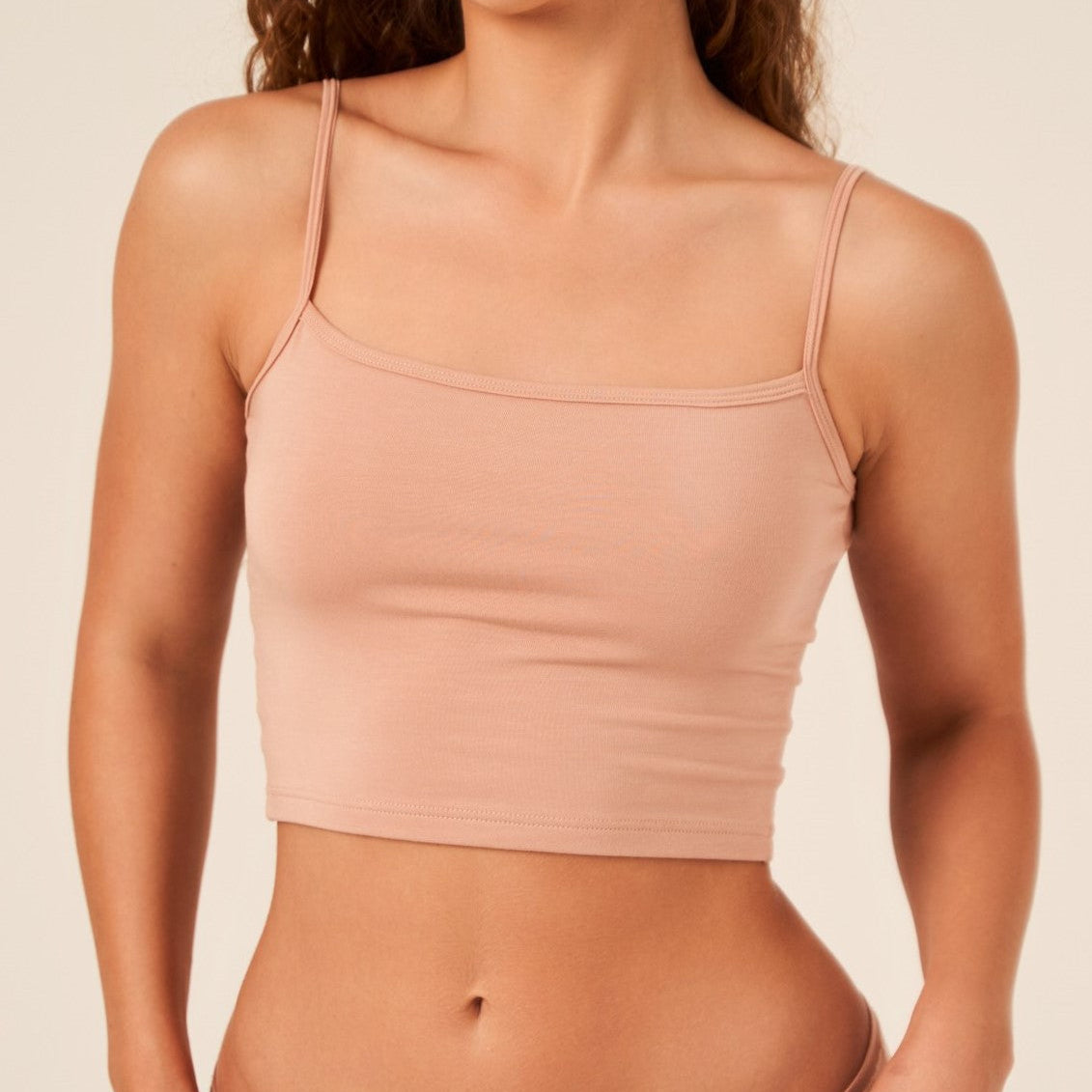 Model wearing nude TENCEL short camisole