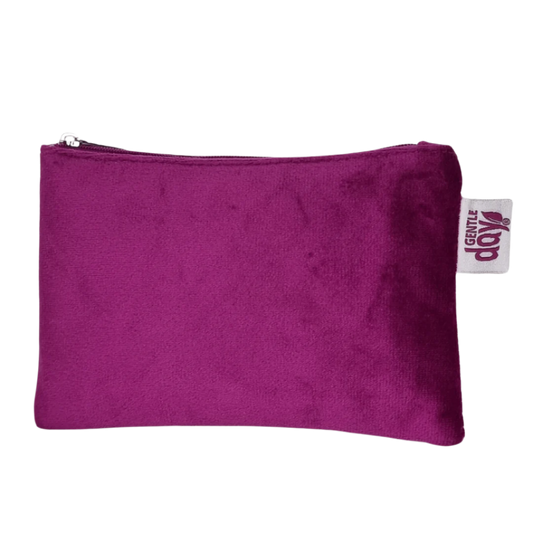 Purple pouch with a visible brand tag on a white background