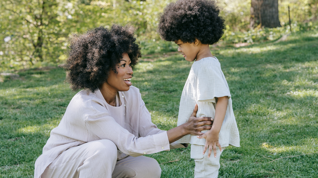 Mother talking to her child